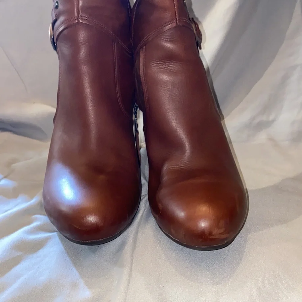 Never worn UGG leather knee high 4” heel with 1/2” platform